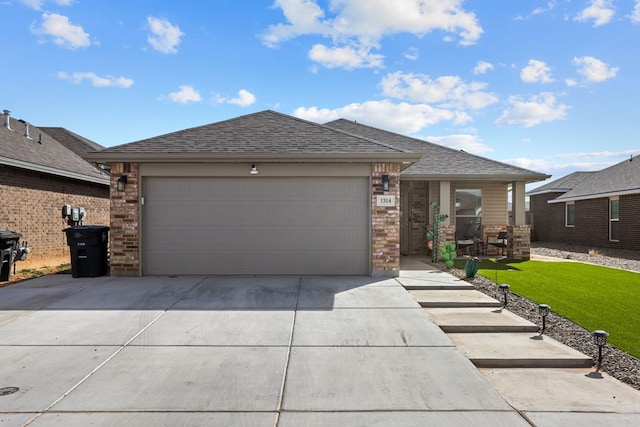 prairie-style house featuring a garage