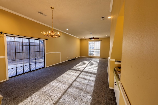 carpeted empty room with ceiling fan with notable chandelier, ornamental molding, visible vents, and baseboards