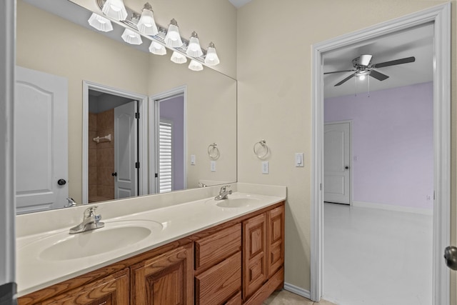 bathroom featuring ceiling fan and vanity