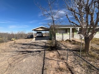 view of front of house with a carport