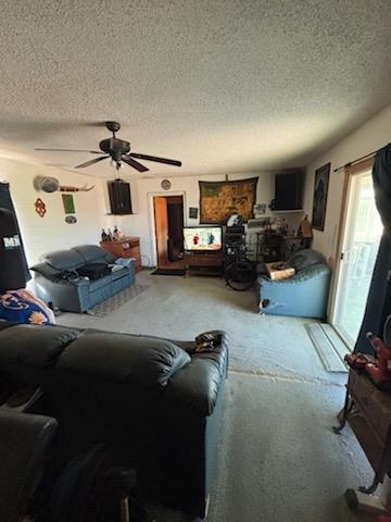 bedroom featuring a textured ceiling and dark tile patterned floors