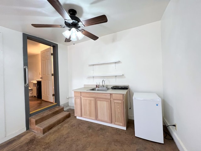 bar featuring refrigerator, sink, ceiling fan, dark hardwood / wood-style floors, and light brown cabinetry