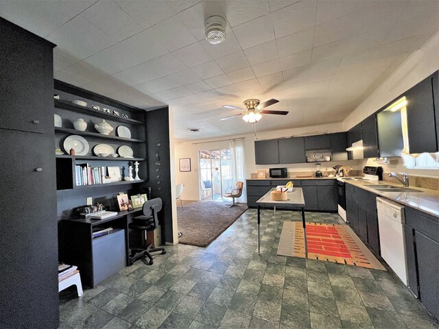 kitchen with ceiling fan, sink, and white appliances