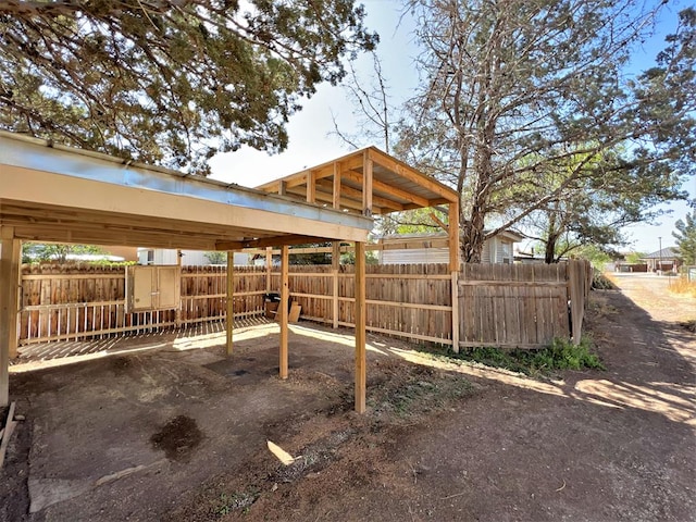 view of car parking with a carport