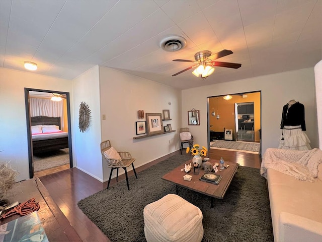 living room featuring dark wood-type flooring