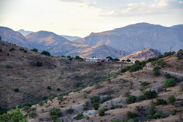 view of mountain feature with a rural view