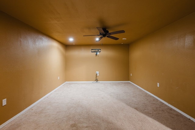 unfurnished room featuring carpet floors and ceiling fan