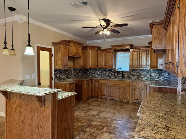 kitchen with a breakfast bar area, backsplash, pendant lighting, and ornamental molding