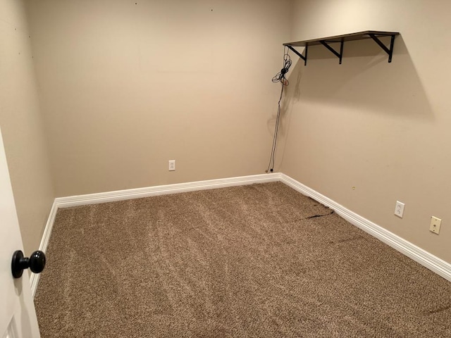 empty room with carpet flooring