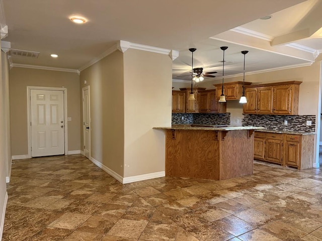 kitchen featuring pendant lighting, decorative backsplash, ceiling fan, kitchen peninsula, and a breakfast bar area