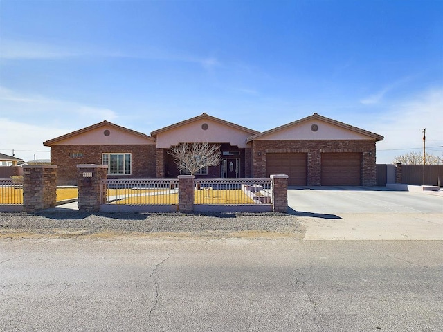 ranch-style house featuring a garage