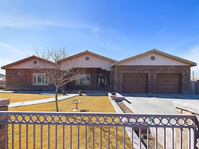 ranch-style house with a front lawn and a garage