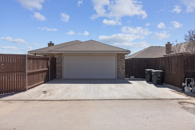 exterior space with fence and driveway