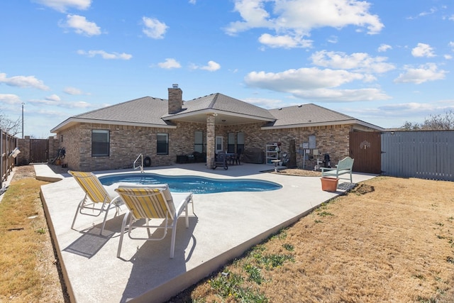 view of pool with a patio area, a fenced in pool, and a fenced backyard