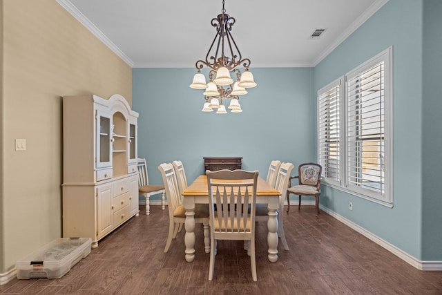 dining area featuring a notable chandelier, visible vents, crown molding, and dark wood-type flooring