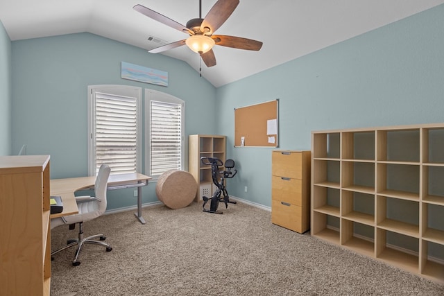 home office with carpet, baseboards, visible vents, lofted ceiling, and ceiling fan