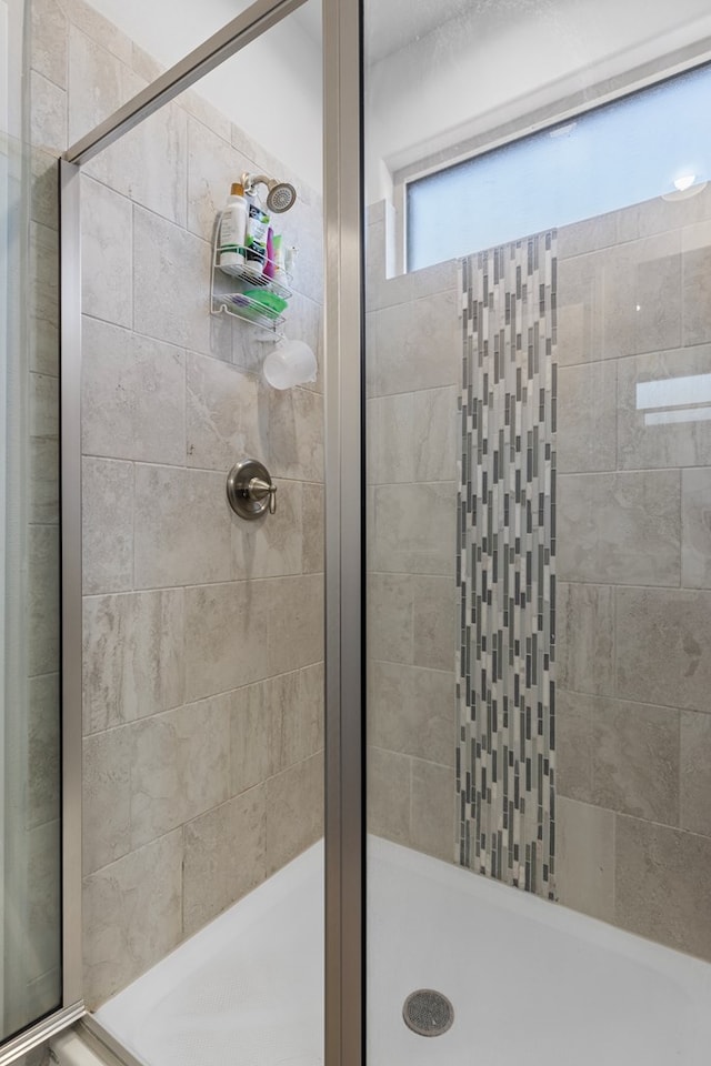 bathroom with a stall shower