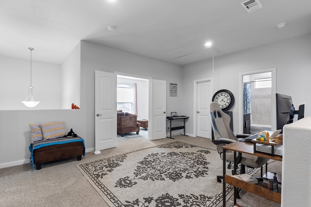 carpeted home office with attic access, visible vents, and baseboards