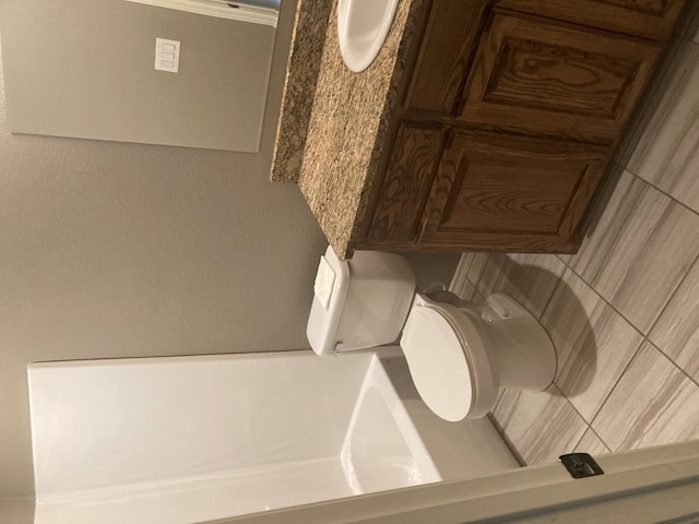 bathroom featuring toilet