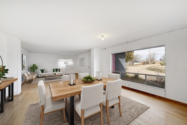 dining space featuring light hardwood / wood-style floors