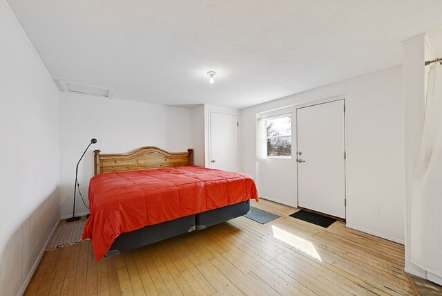 bedroom featuring light wood-type flooring