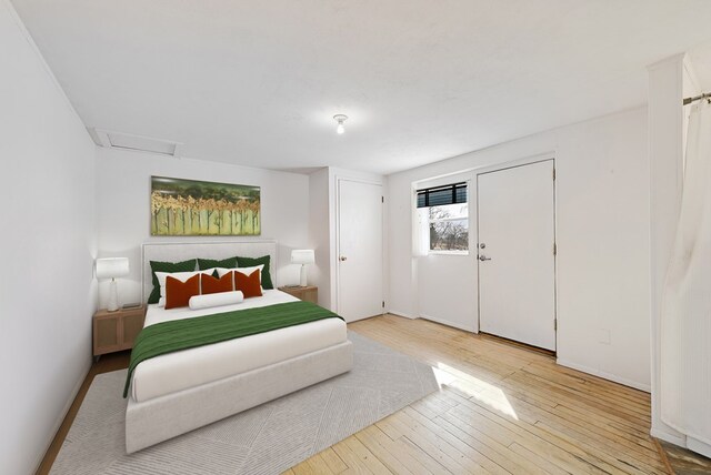 bedroom featuring light wood-type flooring