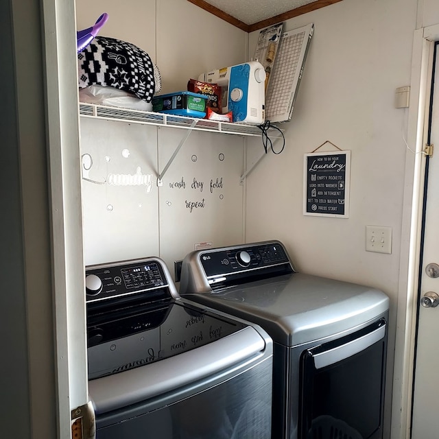 laundry area with separate washer and dryer