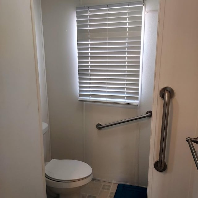 bathroom featuring toilet