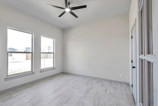 spare room featuring ceiling fan