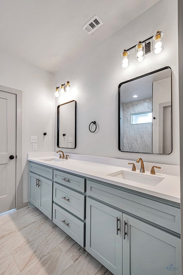 bathroom with vanity and walk in shower