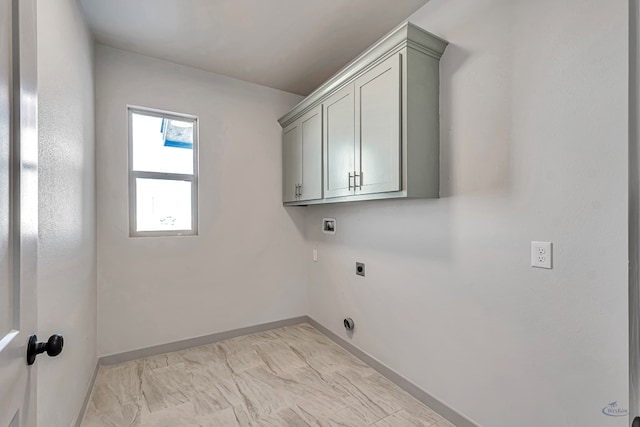 clothes washing area with cabinets and electric dryer hookup