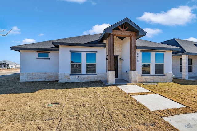 view of front of property with a front lawn