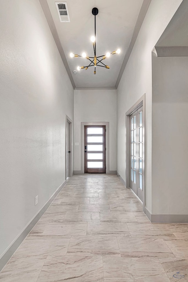 interior space featuring a chandelier