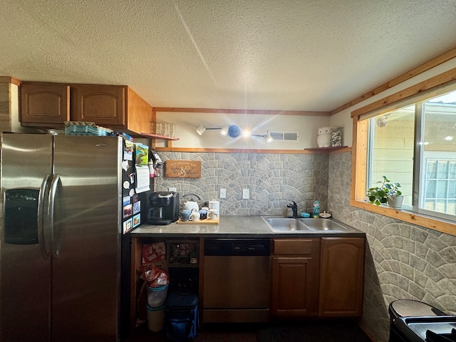 kitchen featuring open shelves, visible vents, appliances with stainless steel finishes, a sink, and a textured ceiling