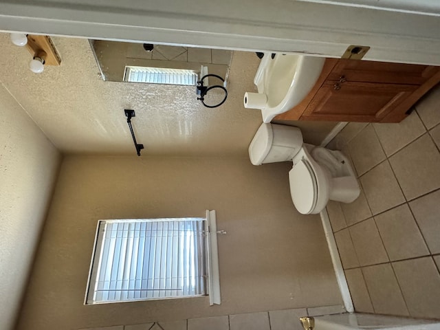 bathroom featuring a textured ceiling