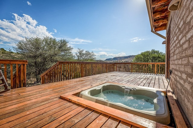 wooden terrace featuring a mountain view