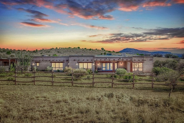 exterior space featuring a mountain view