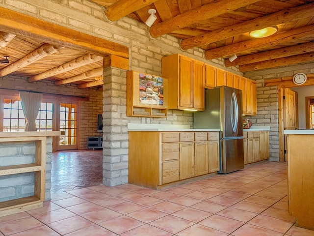 kitchen featuring beam ceiling, wooden ceiling, stainless steel refrigerator, and light tile patterned flooring