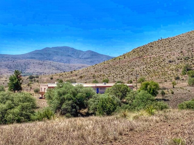 property view of mountains with a rural view