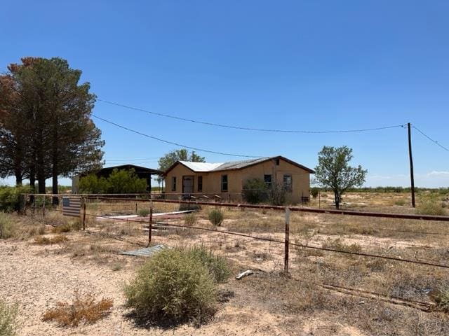 exterior space with a rural view