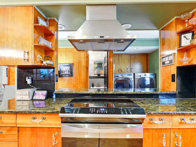 702/704 S Wilbur Ave, Sayre, PA 18840 - kitchen with island exhaust hood, electric stove, washer and clothes dryer, open shelves, and dark stone countertops