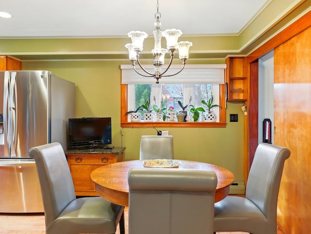 702/704 S Wilbur Ave, Sayre, PA 18840 - dining area featuring a chandelier, ornamental molding, and a baseboard heating unit