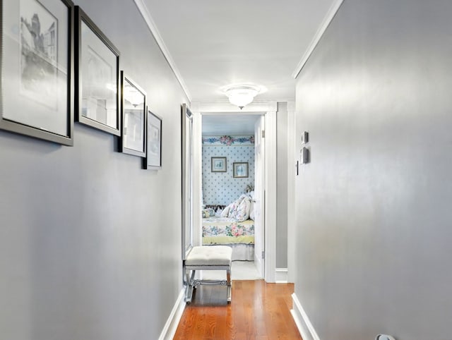 702/704 S Wilbur Ave, Sayre, PA 18840 - hallway featuring wood finished floors, ornamental molding, and baseboards