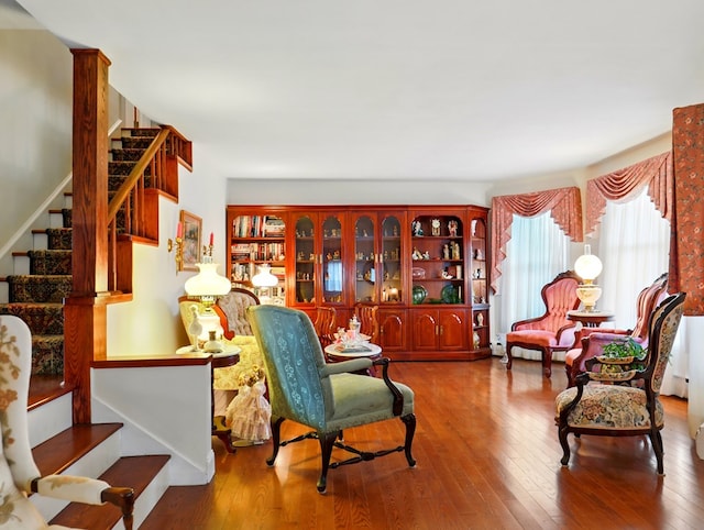 702/704 S Wilbur Ave, Sayre, PA 18840 - sitting room featuring stairway and hardwood / wood-style flooring