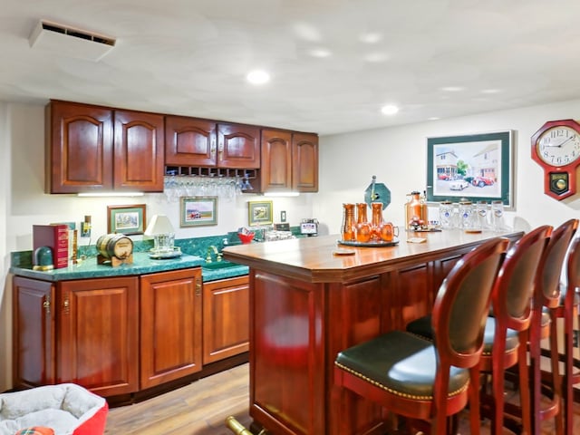 702/704 S Wilbur Ave, Sayre, PA 18840 - indoor wet bar featuring light wood-style floors and recessed lighting