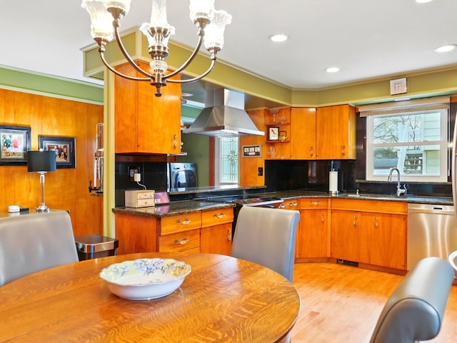 702/704 S Wilbur Ave, Sayre, PA 18840 - kitchen with island exhaust hood, stainless steel dishwasher, a chandelier, dark countertops, and a sink