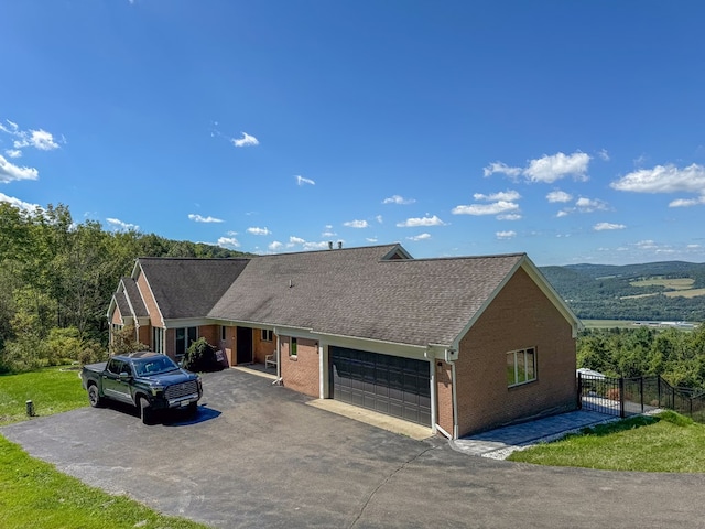 single story home featuring a garage