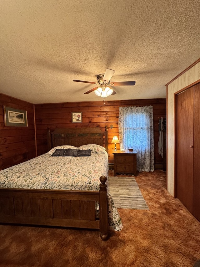 18 Memorial Dr, Duke Center, PA 16729 - carpeted bedroom featuring wooden walls, a textured ceiling, and a ceiling fan