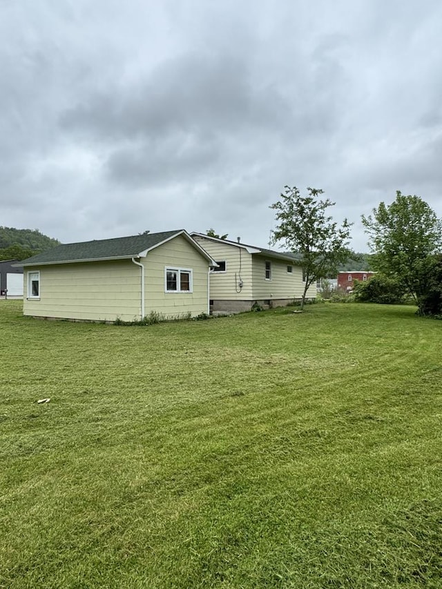 109 Main St, Roulette, PA 16746 - back of property featuring a lawn