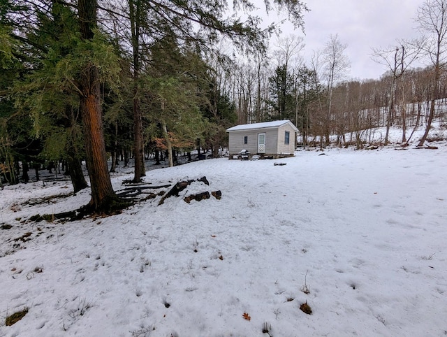 view of yard layered in snow